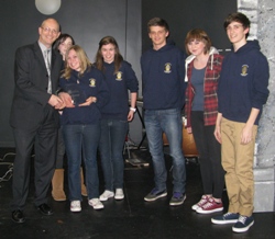 Paul Maliphant (Vice President) presents the trophy to the winning team from Whitchurch High.